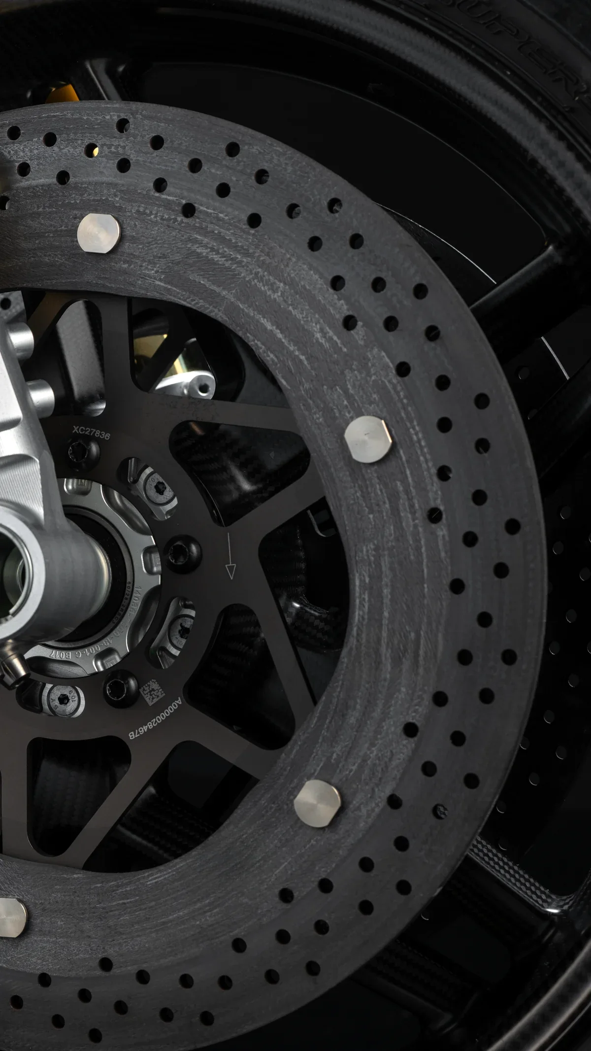 Cross-drilled and vented brake disc, detail