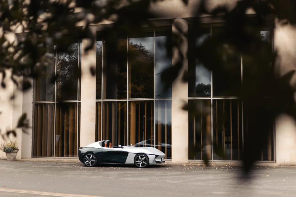 A car parked outside the workshop